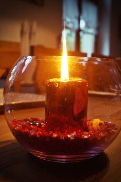 istock A candle in a glass 1250621142