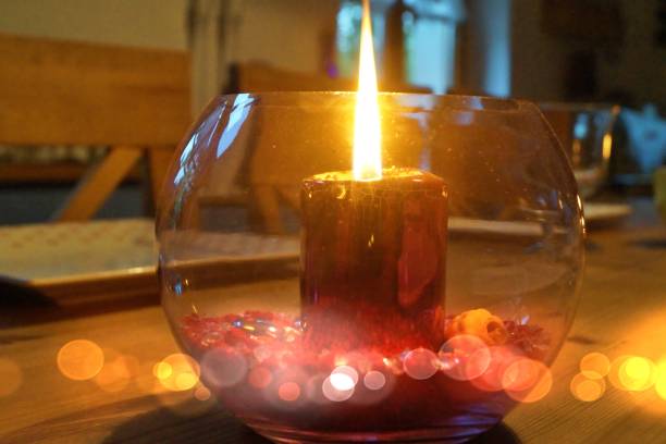 istock A candle in a glass 1250621163