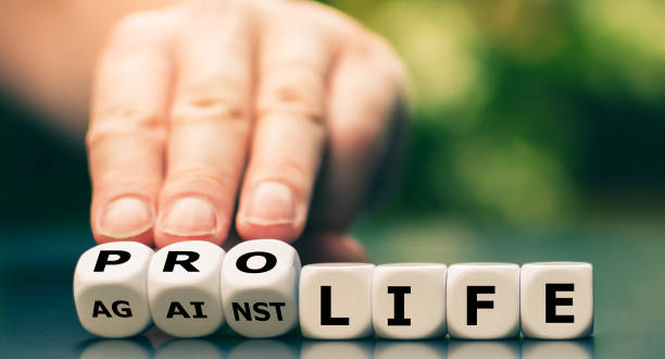 istock Hand turns dice and changes the expression 