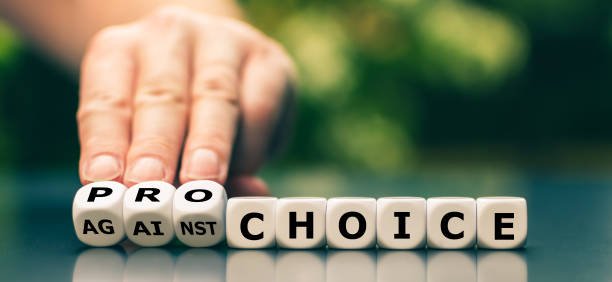 istock Hand turns dice and changes the expression 