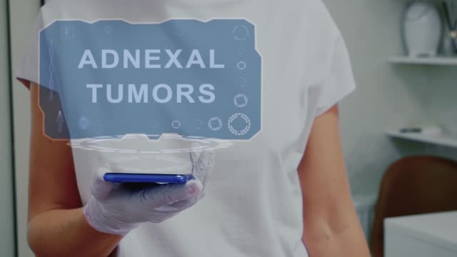 Doctor with hologram Adnexal Tumors