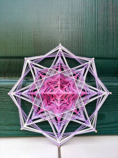 istock Woven bright God's eye mandala home talisman 1250623841
