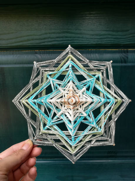istock Woven bright God's eye mandala home talisman 1250624443