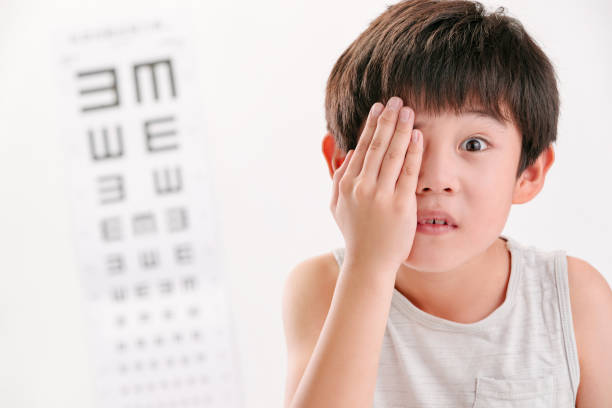 istock The little boy an eye test 1250624769