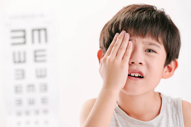 istock The little boy an eye test 1250624795