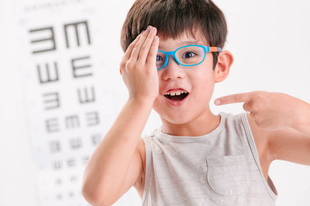 istock The little boy an eye test 1250625889