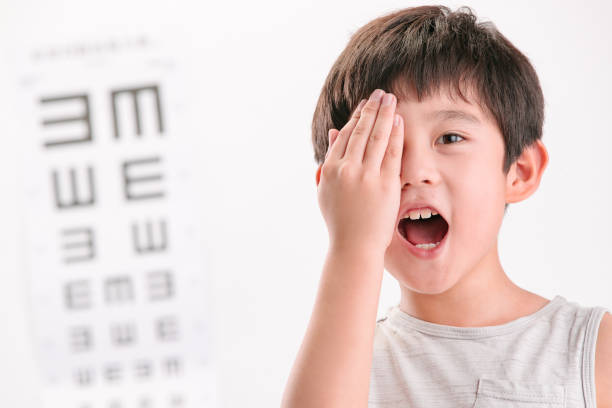 istock The little boy an eye test 1250625962
