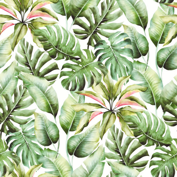 Watercolor seamless pattern with palm leaves Seamless watercolor illustration of tropical leaves. Hand painted. Banner with tropic jungle summertime motif may be used as background texture, wrapping paper, textile or wallpaper design. all over pattern stock illustrations