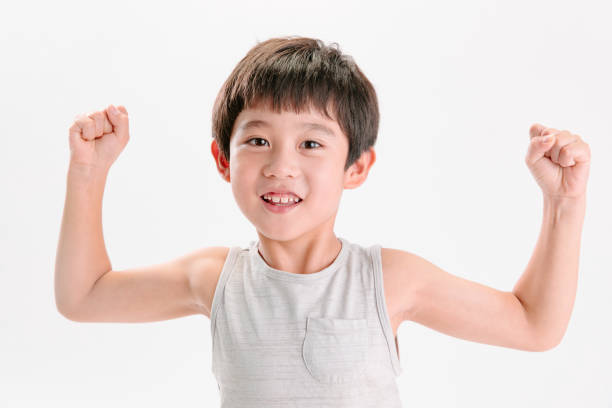 istock Make strong action of lovely little boy 1250628175