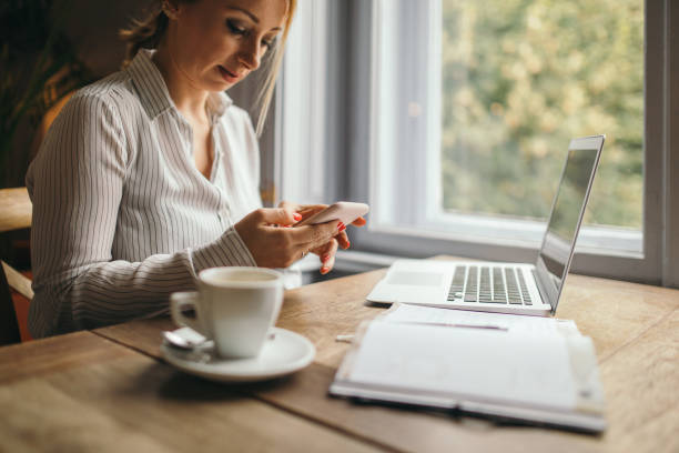istock Attractive woman working on a laptop computer 1250628477
