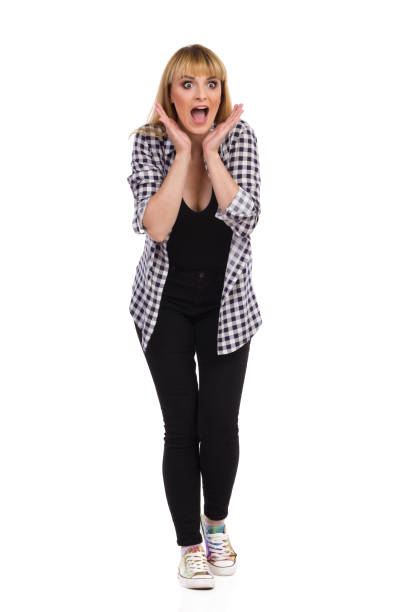 istock Excited Woman Is Holding Head In Hands And Shouting 1250631104