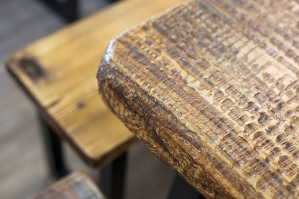 istock Edge and corner of old wooden table top. 1250631255