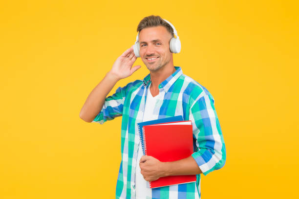 istock Online courses for remote learning during quarantine. Best online learning platforms to explore. Man listening online lecture. Adult student listen music. Guy wear headphones. Infinity learning 1250631462