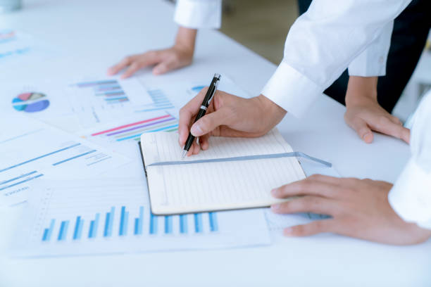 istock The accountant checking documents about graph and chart relating to financial reporting and tax accounting of the company 1250634516