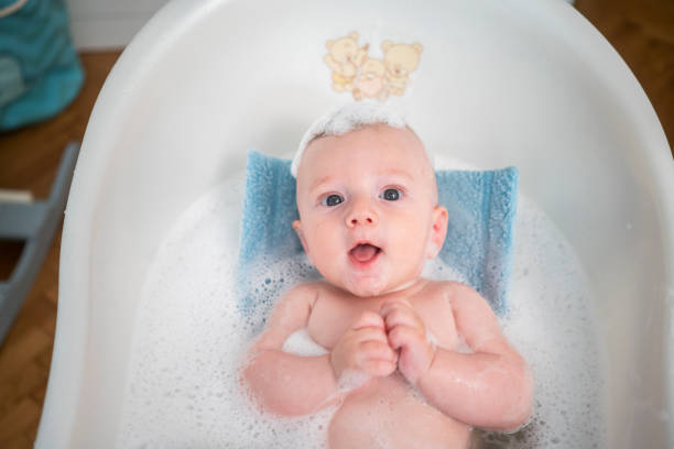 Baby Bathing Stock Photo - Download Image Now - Baby - Human Age, Bathtub, Newborn - iStock