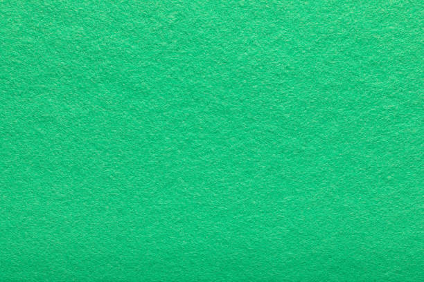 tejido verde de grano fino. fondo de textura. fondo polar verde claro. superficie de fibra peluda. - felt textured textured effect textile fotografías e imágenes de stock