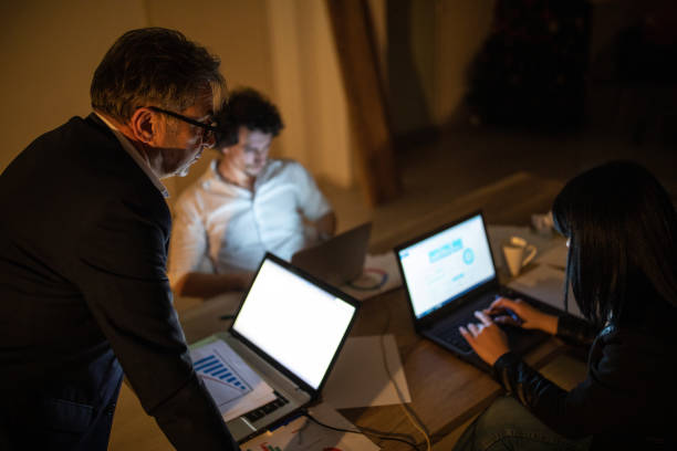 istock Business team working late hours at modern office 1250640398