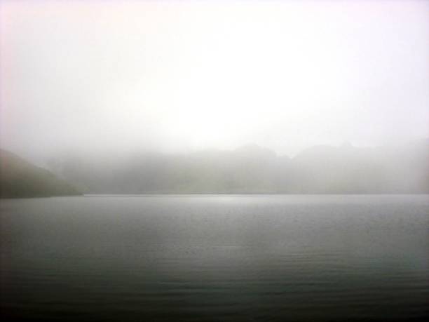 istock FOG LAGOON IN ECUADOR'S ANDEAN MOUNTAIN RANGE 1250641755