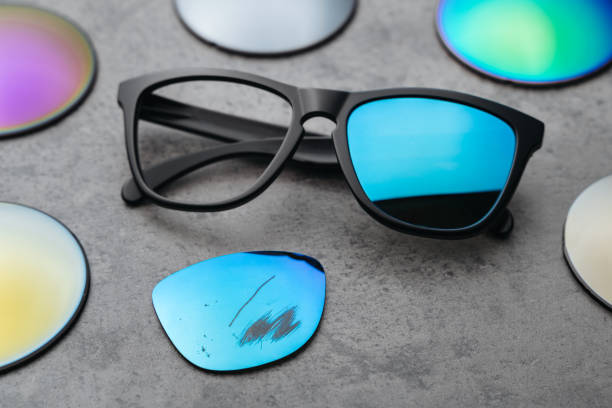 istock Sunglasses with damaged colored lens on table 1250646640