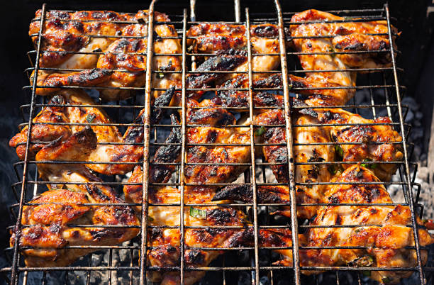 istock Grilled chicken wings in marinade. Barbeque chicken wings 1250647930