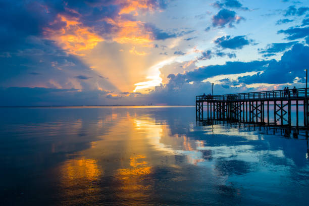 Beautiful sunset on Mobile Bay from Daphne, Alabama Bayfront Park
