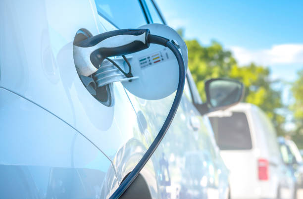 istock Electric Car Charging At Power Station 1250649094
