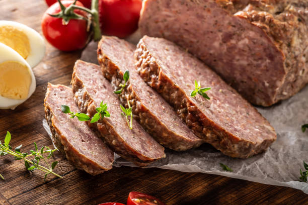 istock Homemade ground meatloaf with eggs tomatoes celery herbs and thyme 1250649576