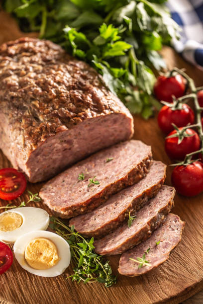 istock Homemade ground meatloaf with eggs tomatoes celery herbs and thyme 1250649604