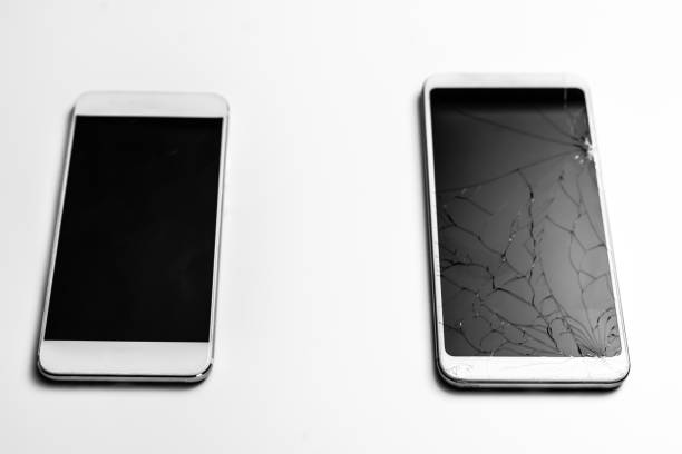 istock Two mobile phone, one with damaged screen, other, white background 1250649692