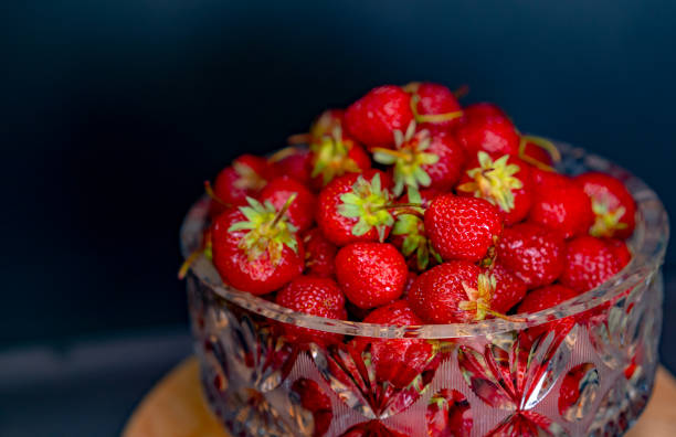 istock Ripe strawberries in a transparent bowl 1250652674