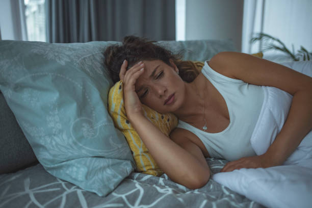 istock Sleepless woman suffering from insomnia, sleep apnea or stress. 1250658012