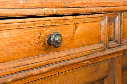 Detail of an old knob turned wood - Old Tuscany furniture - Italy, 19th century.