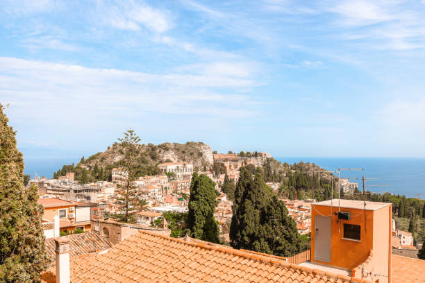 istock Taormina view over the houses with partial blue sky 1250661226