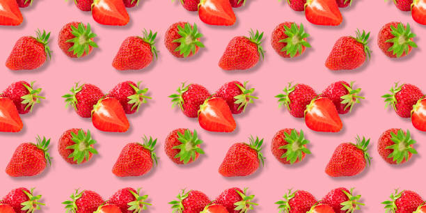 istock Colorful pattern of strawberries on pink background. Top view. Seamless 1250661728