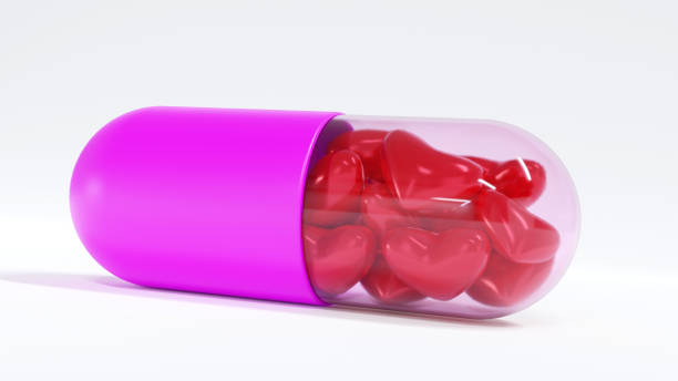 istock The red hearts in a big pink capsule. 1250666259