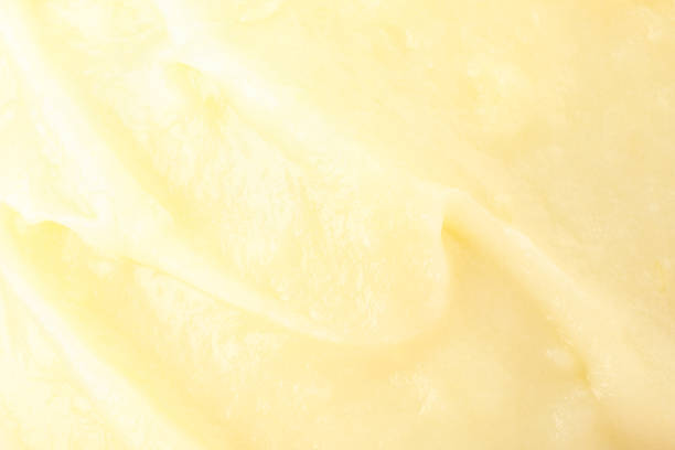 istock Vegetable puree on whole background, macro. Baby food 1250667148