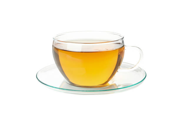 istock Glass cup of chamomile tea isolated on white background 1250667591