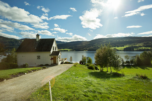 Norway, September 19, 2013 : Amazing Nature Landscape ,Houses,Lake ,Green Fields and Mountains view in Norway