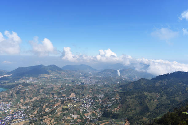 istock Panorama of the mountains with clouds 1250674306