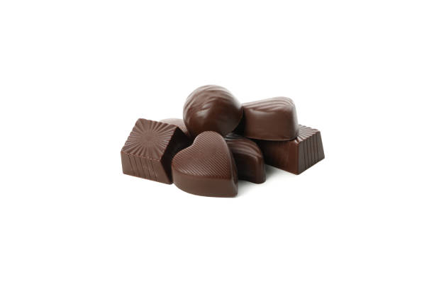 istock Tasty chocolate candies isolated on white background 1250677473