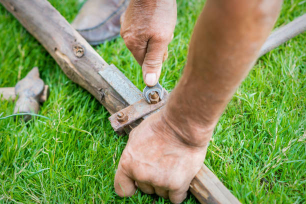 istock Elderly man twists the nut by wrench 1250680560