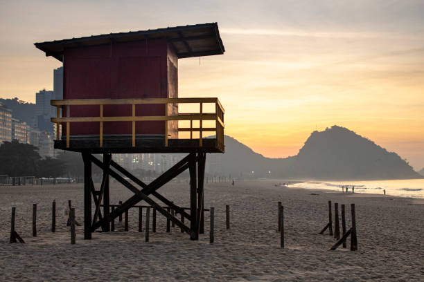 istock Old lifeguard post on Copacabana beach at sunrise 1250681766