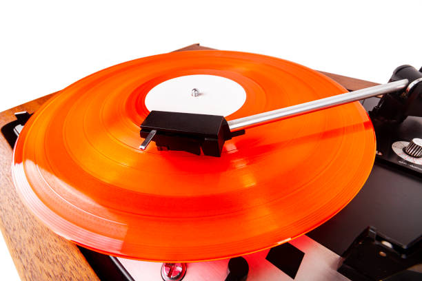 istock Vintage turntable with a red vinyl isolated on white 1250682480