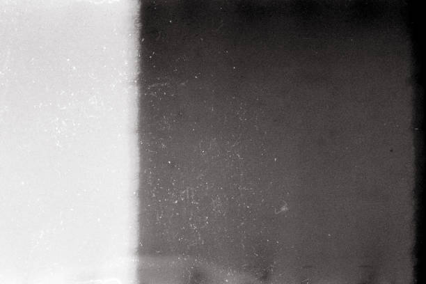 istock Noisy film frame with heavy scratches, dust and grain 1250682502