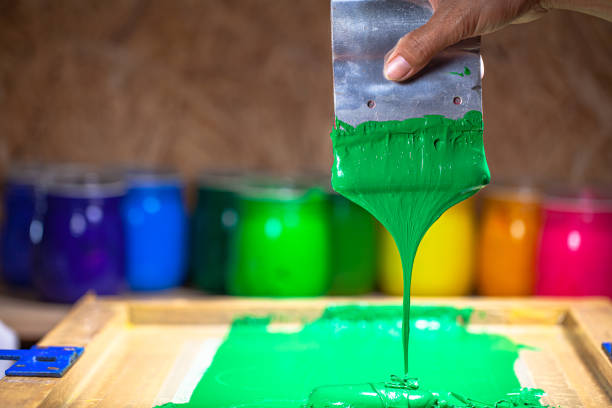 istock green color dripping from hand screen printing 1250686071