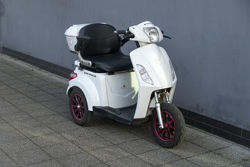 Berlin, Germany - June 16, 2020: E-Mover three wheels electric scooter by GreenStreet