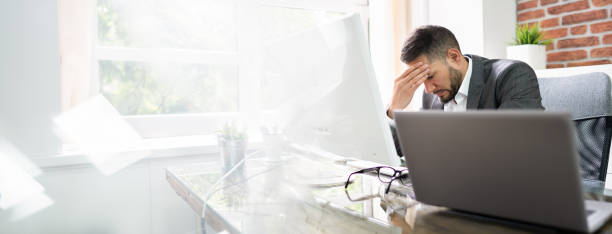 istock Stressed Man With Migraine And Headache 1250688827