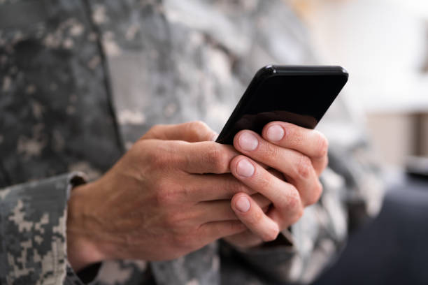istock Social Cyber Warfare. Army Soldier Using Phone 1250690149