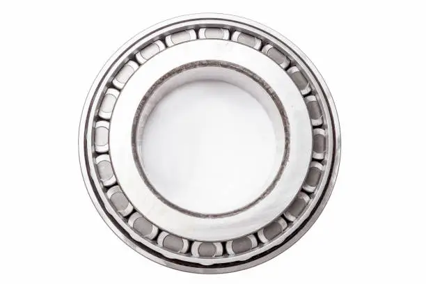 Single row tapered roller bearing made of chromed metal is designed to absorb radial and one-sided axial loads on the undercarriage of a vehicle. Sale spare parts or repairs in workshop or car service