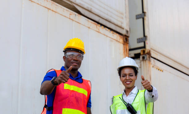 istock Success Teamwork Concept, Engineer and worker team in hard hat smiling with giving thumbs up as sign of Success 1250697041